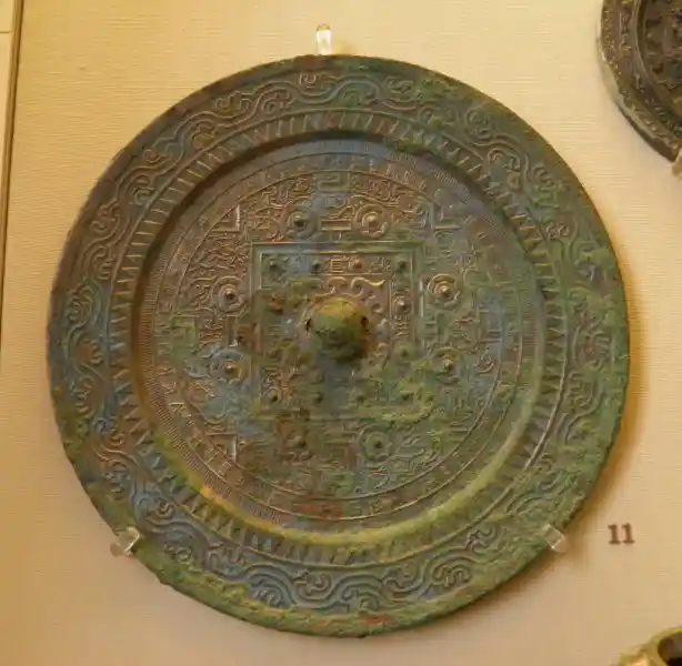 Solar disc on a bronze mirror Solar disc on a bronze mirror
